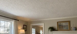 Textured popcorn ceiling in a lived-in New England home.