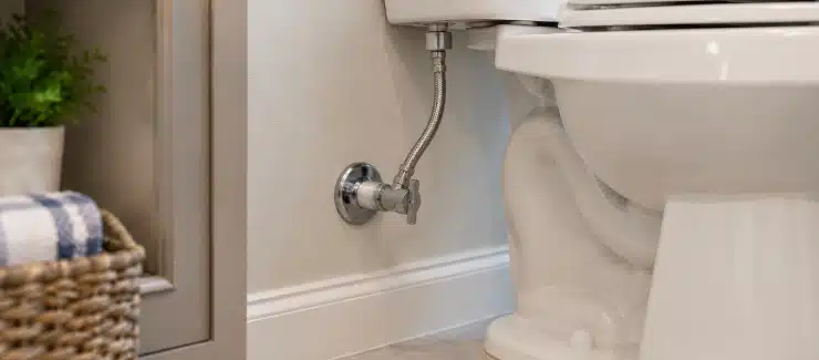 repaired plumbing connection after a small leak in a Florida home
